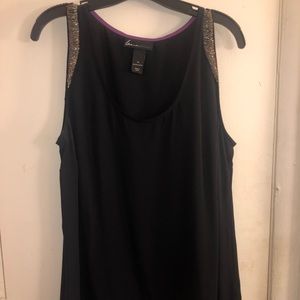 Very classy top to add to your collection!